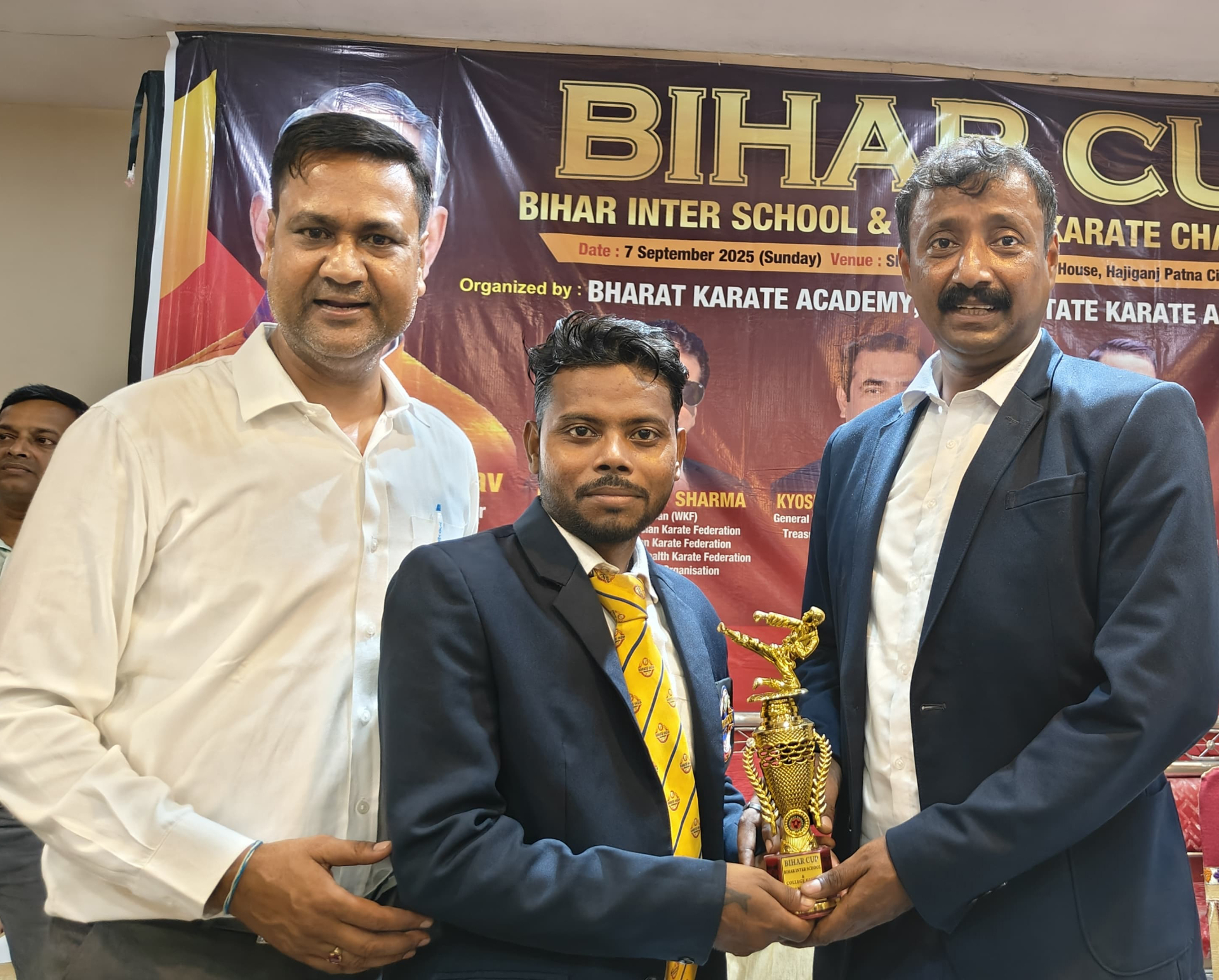 Rensei Akhilesh Kumar receiving trophy at Bihar Cup Inter School & College Karate Championship 2025