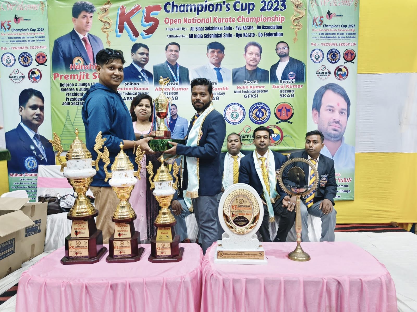 Rensei Akhilesh Kumar receiving the K5 Champion's Cup 2023 Open National Karate Championship trophy